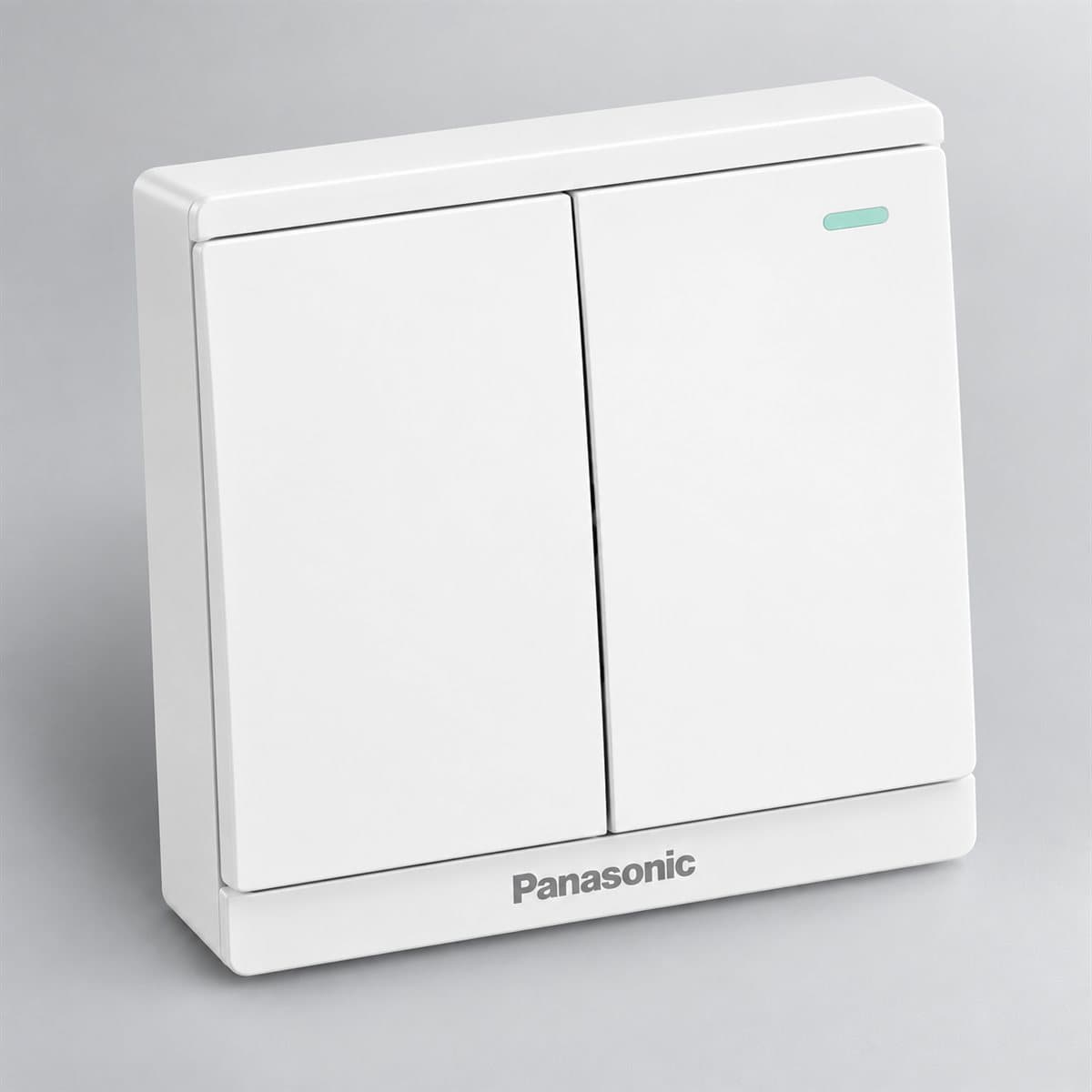 Bộ 2 công tắc B, 1 chiều, dạ quang Moderva Panasonic chụp góc nghiêng 3/4, thấy rõ mặt và cạnh bên