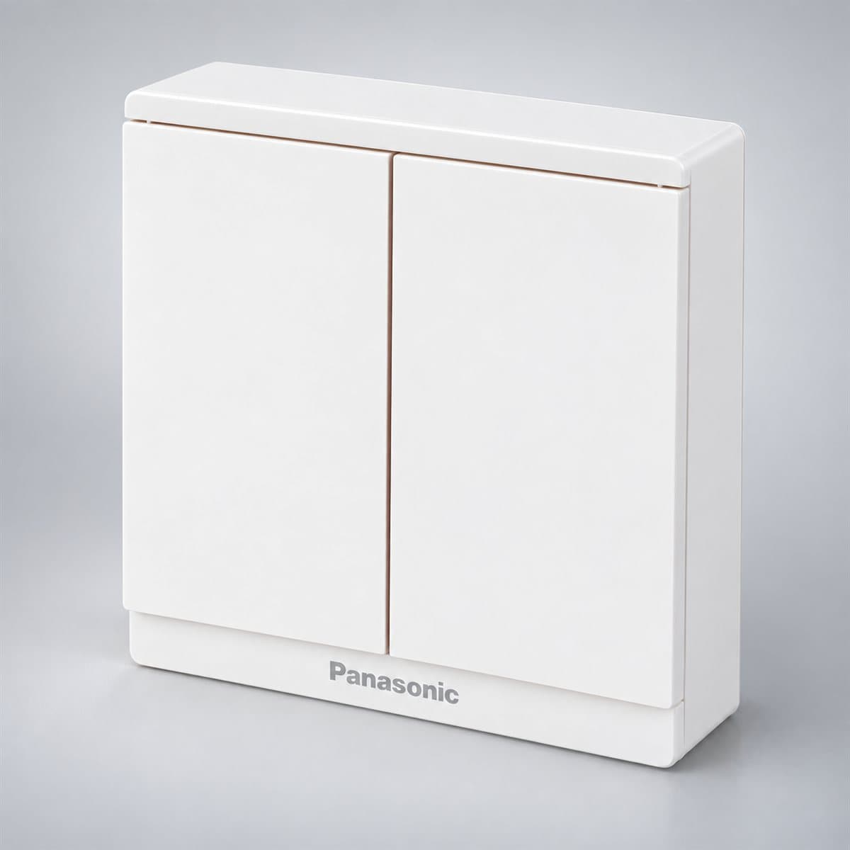 Bộ 2 công tắc B, 1 chiều, bắt vít Moderva Panasonic chụp góc nghiêng 3/4, thấy rõ mặt và cạnh bên