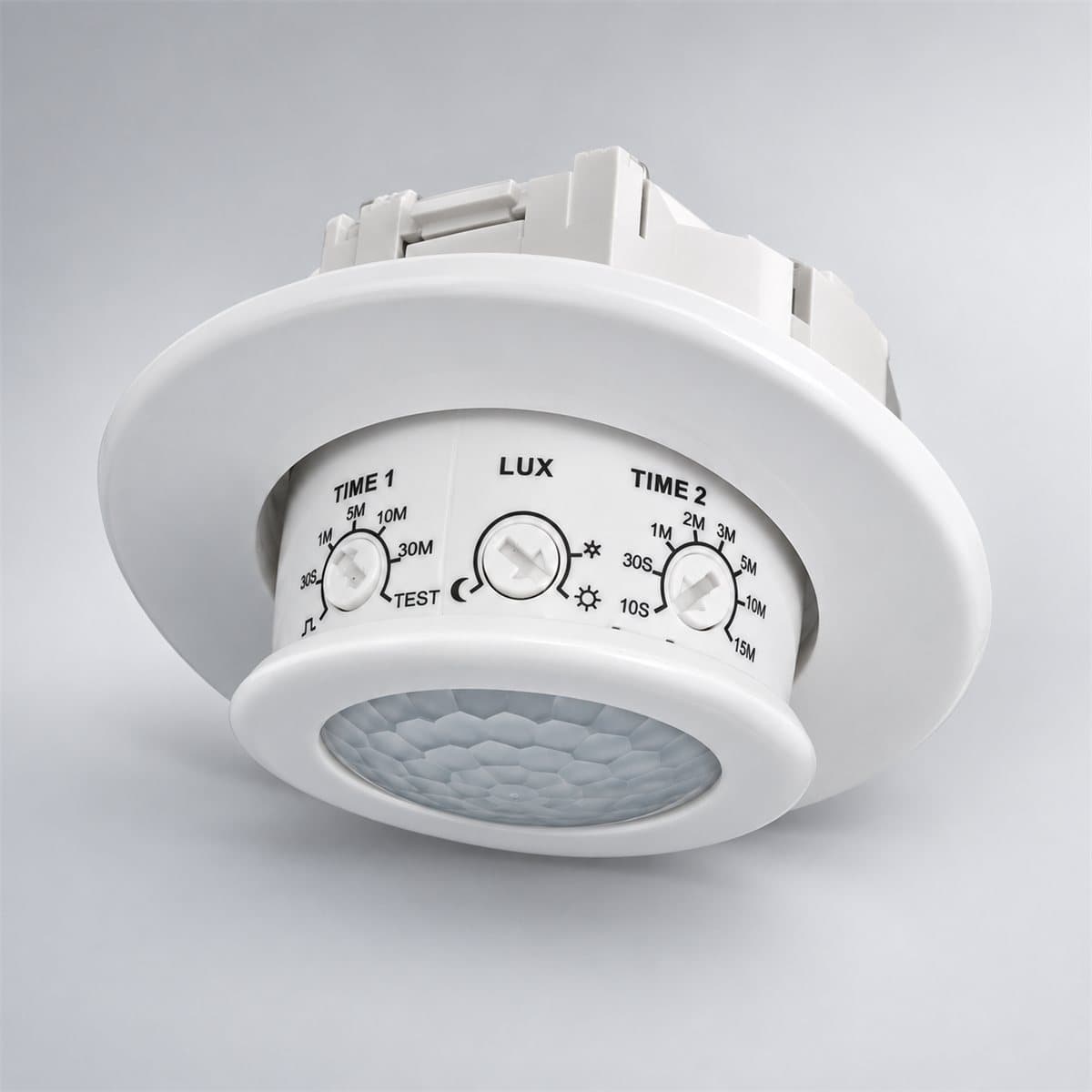 Cảm biến hồng ngoại mini 360 độ Schneider chụp góc nghiêng 3/4, thấy rõ mặt và cạnh bên