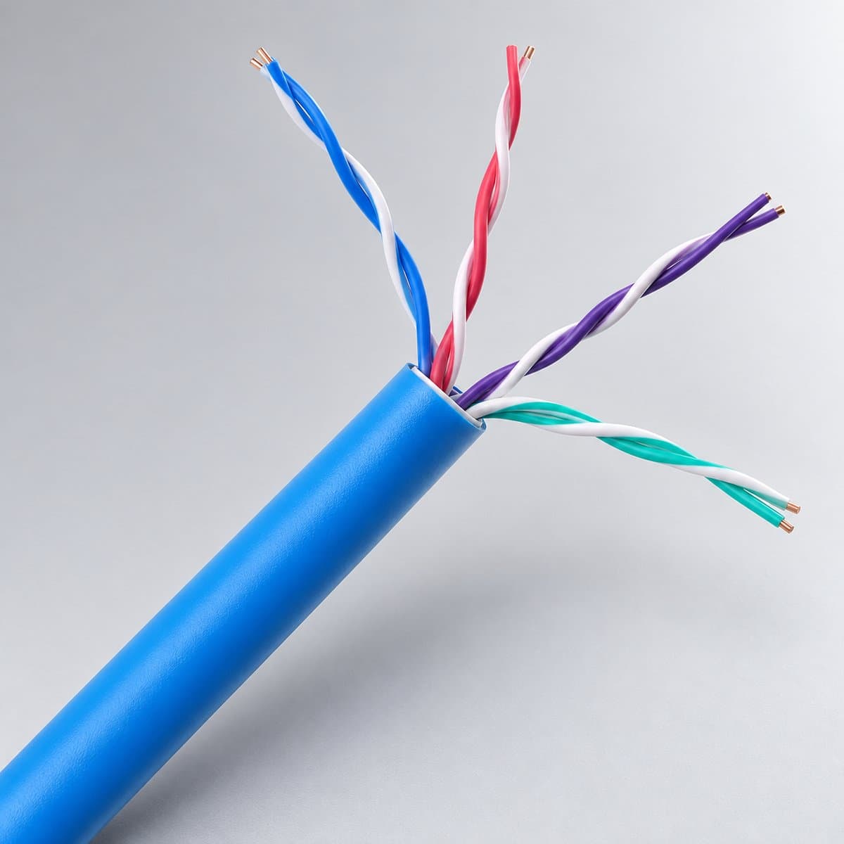 Dây cáp mạng, cáp đồng trục, dây điện thoại, băng keo cách điện Panasonic chụp góc nghiêng 3/4, thấy rõ mặt và cạnh bên