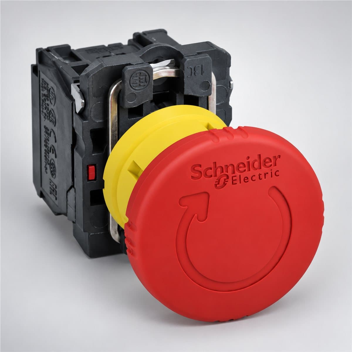 Nút dừng khẩn xoay nhả trọn bộ Harmony XB5 Schneider chụp góc nghiêng 3/4, thấy rõ mặt và cạnh bên