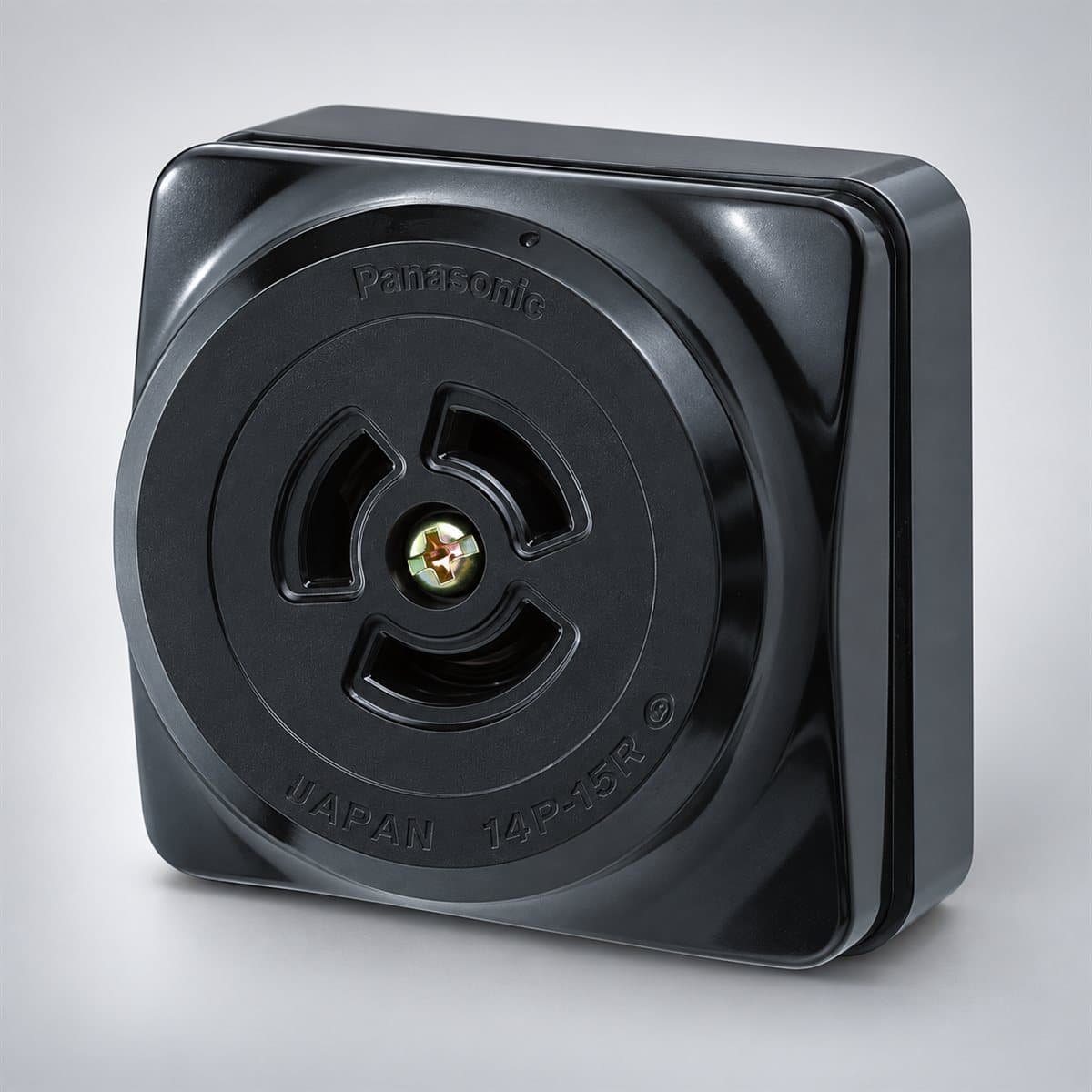Ổ cắm locking loại nổi, màu đen công nghiệp Panasonic chụp góc nghiêng 3/4, thấy rõ mặt và cạnh bên