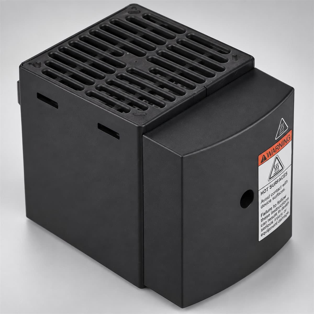 Điện trở sưởi cách điện có quạt cho tủ điện Schneider chụp góc nghiêng 3/4, thấy rõ mặt và cạnh bên