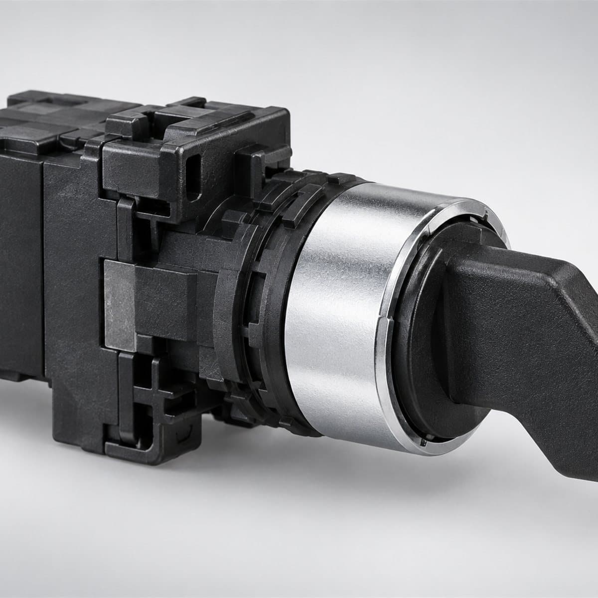 Công tắc xoay tay nắm ngắn Harmony XA2 Ø22 Schneider chụp góc nghiêng 3/4, thấy rõ mặt và cạnh bên