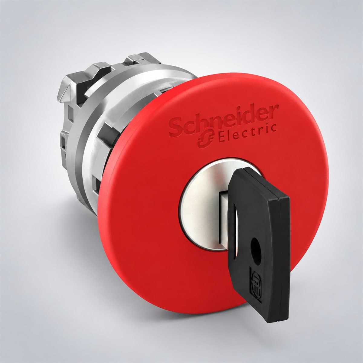 Đầu nút dừng khẩn nhả bằng chìa Harmony XB4 Schneider chụp góc nghiêng 3/4, thấy rõ mặt và cạnh bên
