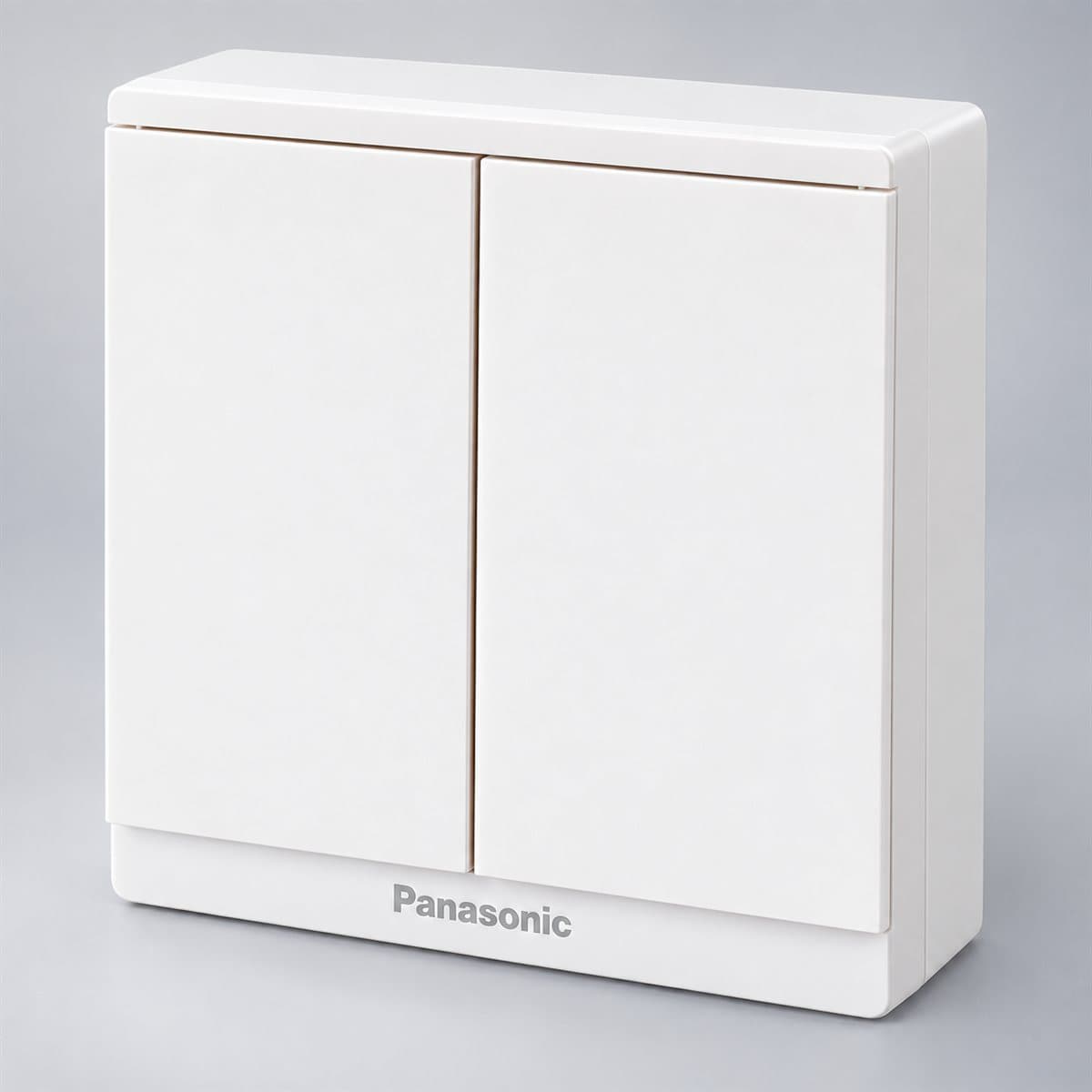 Bộ 2 công tắc C, 2 chiều, bắt vít Moderva Panasonic chụp góc nghiêng 3/4, thấy rõ mặt và cạnh bên
