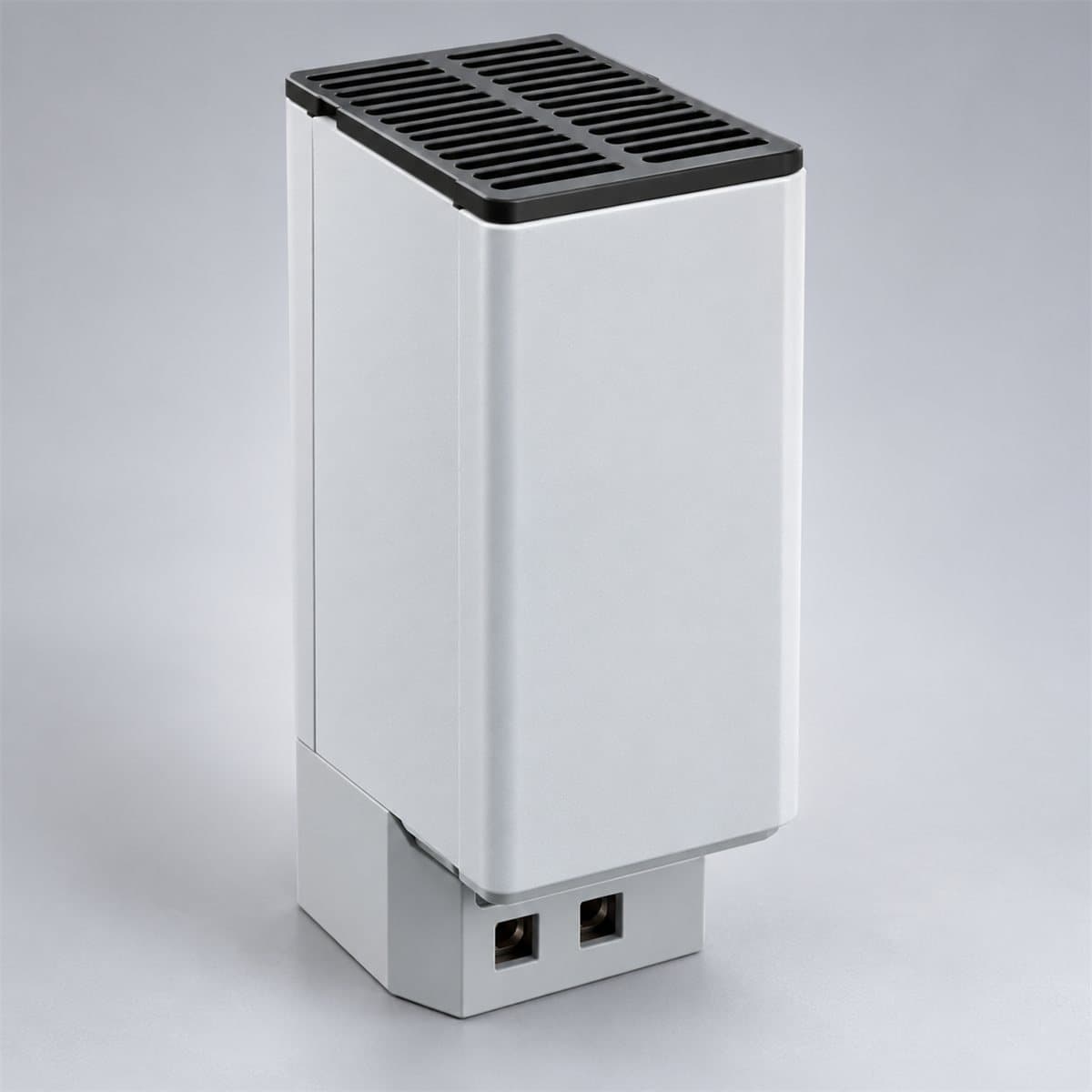 Điện trở sưởi cách điện 2 cực cho tủ điện Schneider chụp góc nghiêng 3/4, thấy rõ mặt và cạnh bên
