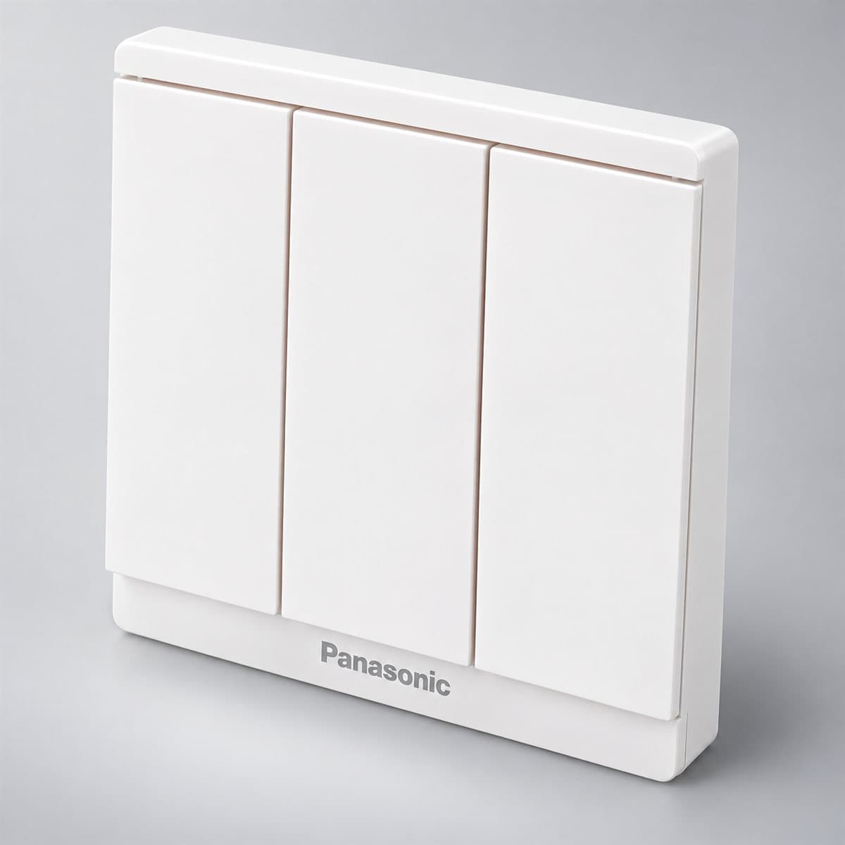 Bộ 3 công tắc B, 1 chiều, bắt vít Moderva Panasonic chụp góc nghiêng 3/4, thấy rõ mặt và cạnh bên